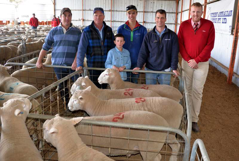 Ben Stark (2nd left), Stark Grazing, Naracoorte was the dominant volume buyer of Poll Dorset rams at Bundara Downs with 20 at a $1425 average. He is pictured with Greg Funke, Bundara Downs, his son Sam (9 years), jackeroo Jock Williams, assistant manager Craig Altmann and Elders agent Dean Coddington.